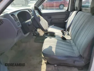 1998 Nissan Frontier XE with VIN 1N6DD21S8WC386978, listed as a Copart auction lot 58776015 with Not provided miles and Clean title. Bid and sale history available at DreamBid. Image 7.