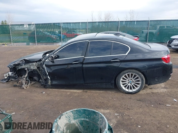 2014 BMW 5 Series 528i xDrive with VIN WBA5A7C56ED612168, listed as a IAAI auction lot 41746600 with 115,117 mi miles and . Bid and sale history available at DreamBid. Image 13.