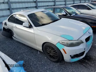2015 BMW 2 Series 228i with VIN WBA1F5C52FV256575, listed as a Copart auction lot 88515575 with 127,012 mi miles and Salvage Title. Bid and sale history available at carsss.com. Image 4.