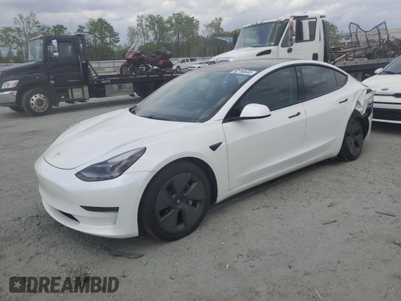 2021 Tesla Model 3 Standard Range Plus z VIN 5YJ3E1EAXMF973450, wystawiony jako Copart lot #52766645 z przebiegiem 66 827 mil mil oraz Szkoda całkowita • Salvage title. Historia ofert i sprzedaży dostępna na DreamBid. Obrazek 1.