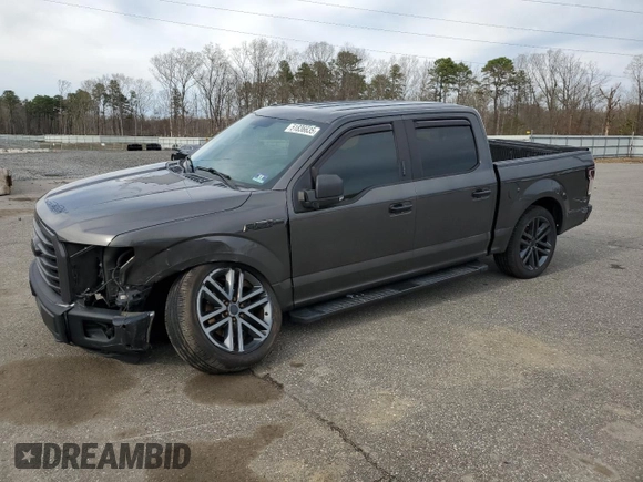 2015 Ford F-150 XLT with VIN 1FTEW1E87FFC44971, listed as a Copart auction lot 51836635 with 206,184 mi miles and Salvage Title. Bid and sale history available at DreamBid. Image 1.