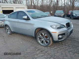2012 BMW X6 50i z VIN 5UXFG8C58CL590171, wystawiony jako IAAI lot #41087730 z przebiegiem 83 143 mil mil oraz . Historia ofert i sprzedaży dostępna na DreamBid. Obrazek 1.