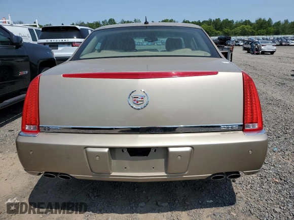 2006 Cadillac DTS 1SC z VIN 1G6KD57Y26U175599, wystawiony jako Copart lot #59149155 z przebiegiem 172 952 mil mil oraz Czysty tytuł • Clean title. Historia ofert i sprzedaży dostępna na DreamBid. Obrazek 6.