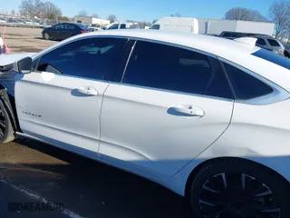 2018 Chevrolet Impala LT with VIN 2G1105S30J9147850, listed as a IAAI auction lot 41446121 with 140,789 mi miles. Bid and sale history available at carsss.com. Image 14.