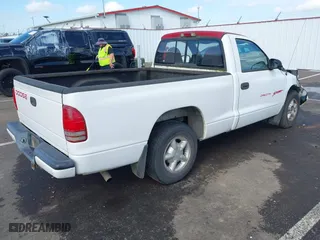 1999 Dodge Dakota SLT with VIN 1B7FL26X9XS109444, listed as a IAAI auction lot 41753871 with 254,190 mi miles. Bid and sale history available at carsss.com. Image 4.