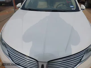 2016 Lincoln MKZ with VIN 3LN6L2GK1GR604523, listed as a IAAI auction lot 42005012 with 215,285 mi miles. Bid and sale history available at carsss.com. Image 10.