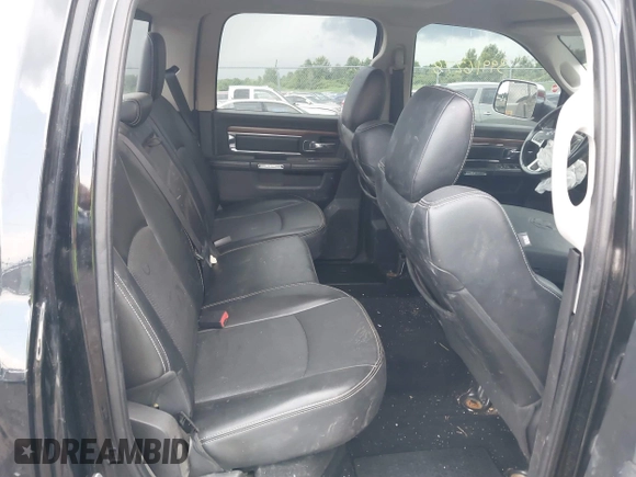2013 Ram 2500 Laramie z VIN 3C6UR5FL0DG516938, wystawiony jako IAAI lot #39916278 z przebiegiem 198 845 mil mil oraz . Historia ofert i sprzedaży dostępna na DreamBid. Obrazek 8.