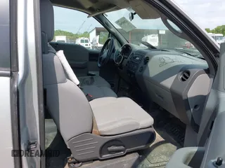 2005 Ford F-150 STX with VIN 1FTRX14W55FA69973, listed as a IAAI auction lot 42080948 with 250,000 mi miles and . Bid and sale history available at carsss.com. Image 5.