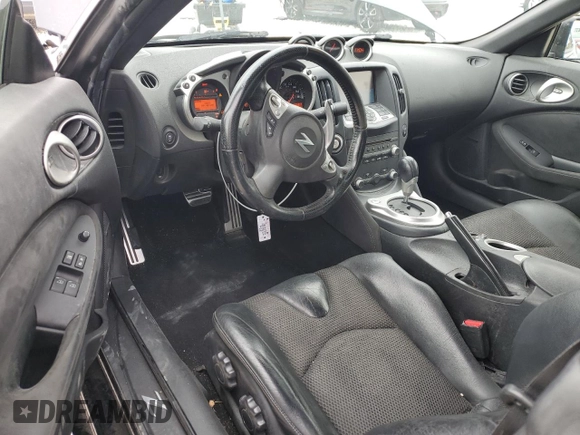 2014 Nissan 370Z Touring with VIN JN1AZ4FH1EM620177, listed as a Copart auction lot 42581255 with 106,957 mi miles and Salvage Title. Bid and sale history available at DreamBid. Image 8.