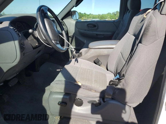 2003 Ford F-150 XL with VIN 1FTRX07W03KD12910, listed as a Copart auction lot 57864555 with Not provided miles and Salvage title. Bid and sale history available at DreamBid. Image 7.