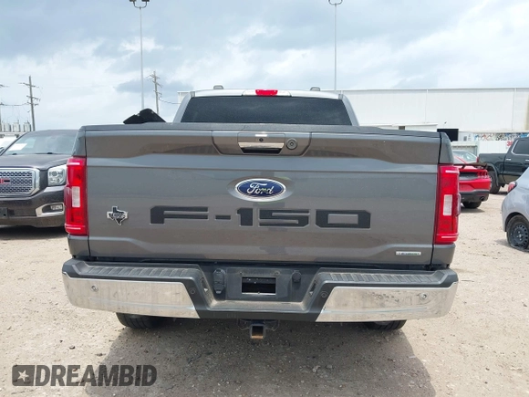 2021 Ford F-150 XL with VIN 1FTEW1CP1MKD21526, listed as a IAAI auction lot 42104907 with 76,317 mi miles and . Bid and sale history available at DreamBid. Image 17.