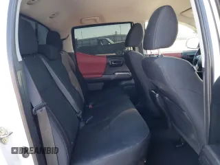 2017 Toyota Tacoma SR z VIN 5TFAX5GNXHX074690, wystawiony jako Copart lot #56672165 z przebiegiem 107 292 mil mil oraz Szkoda całkowita • Salvage title. Historia ofert i sprzedaży dostępna na DreamBid. Obrazek 10.