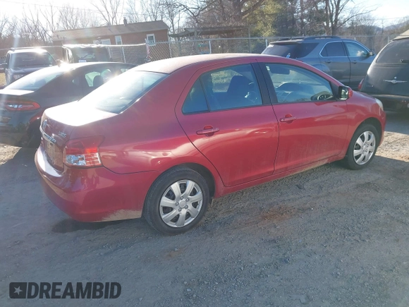 2010 Toyota Yaris with VIN JTDBT4K39A4070153, listed as a IAAI auction lot 41519671 with 169,090 mi miles and . Bid and sale history available at carsss.com. Image 4.