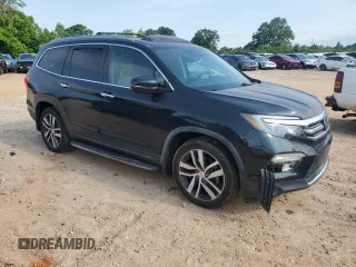 2018 Honda Pilot Elite with VIN 5FNYF6H03JB019900, listed as a Copart auction lot 57497235 with 60,358 mi miles and Salvage title. Bid and sale history available at DreamBid. Image 4.