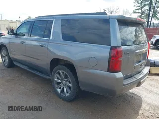 2018 Chevrolet Suburban LT with VIN 1GNSKHKC3JR207477, listed as a IAAI auction lot 41716372 with 168,601 mi miles. Bid and sale history available at carsss.com. Image 3.