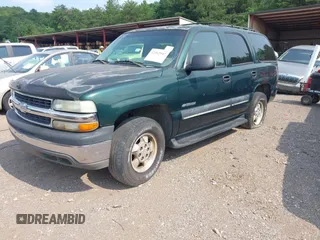 2002 Chevrolet Tahoe LS with VIN 1GNEC13V92J308220, listed as a IAAI auction lot 42362047 with 230,859 mi miles and . Bid and sale history available at DreamBid. Image 2.
