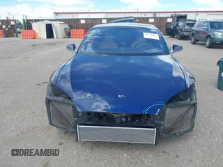 2016 Tesla Model S 70 with VIN 5YJSA1E18GF174200, listed as a IAAI auction lot 42274415 with 65,231 mi miles and . Bid and sale history available at DreamBid. Image 12.