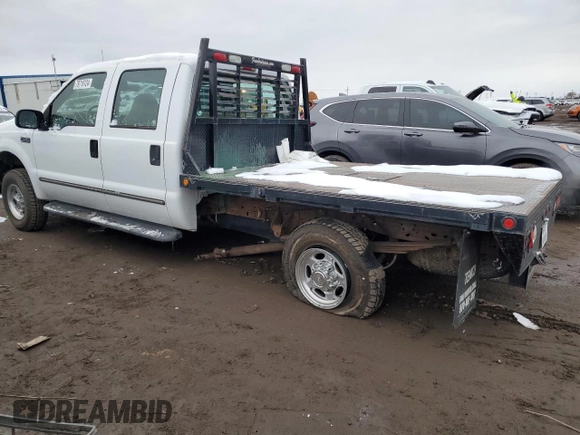 2000 Ford Super Duty F-250 XL with VIN 1FTNW21SXYEB02887, listed as a Copart auction lot 79716124 with 184,020 mi miles and Salvage Title. Bid and sale history available at carsss.com. Image 2.