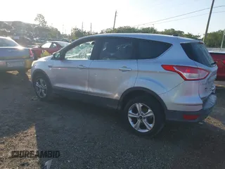 2015 Ford Escape SE with VIN 1FMCU0G95FUA44739, listed as a IAAI auction lot 42030903 with 182,826 mi miles. Bid and sale history available at carsss.com. Image 3.