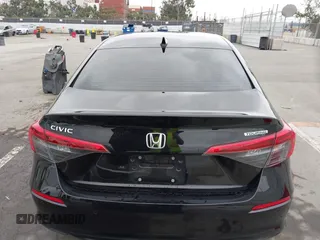 2022 Honda Civic Sedan Touring with VIN 2HGFE1F91NH308547, listed as a IAAI auction lot 41882514 with 39,249 mi miles. Bid and sale history available at carsss.com. Image 16.