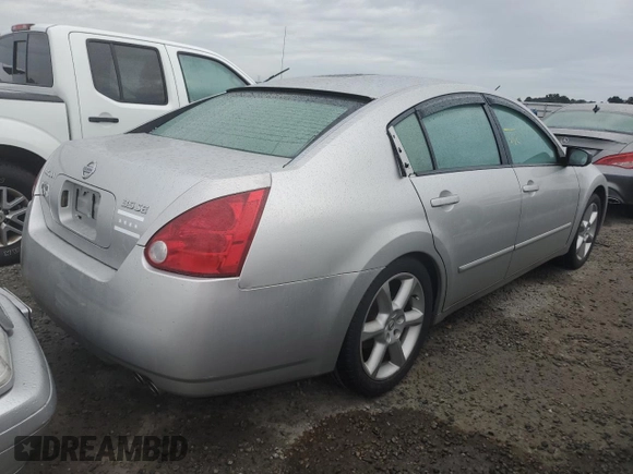 2004 Nissan Maxima SE with VIN 1N4BA41E14C889912, listed as a Copart auction lot 74379814 with 0 mi miles and Salvage Title. Bid and sale history available at carsss.com. Image 3.