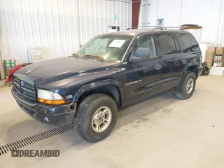 1999 Dodge Durango z VIN 1B4HS28Y1XF700830, wystawiony jako IAAI lot #42372223 z przebiegiem 247 159 mil mil oraz . Historia ofert i sprzedaży dostępna na DreamBid. Obrazek 2.