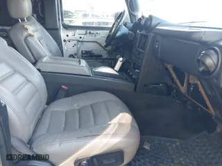 2005 Hummer H2 SUT with VIN 5GRGN22UX5H106653, listed as a IAAI auction lot 42015559 with 180,519 mi miles. Bid and sale history available at carsss.com. Image 5.
