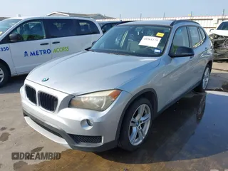 2014 BMW X1 sDrive28i z VIN WBAVM1C51EVW52544, wystawiony jako IAAI lot #41901275 z przebiegiem 117 832 mil mil oraz . Historia ofert i sprzedaży dostępna na DreamBid. Obrazek 19.