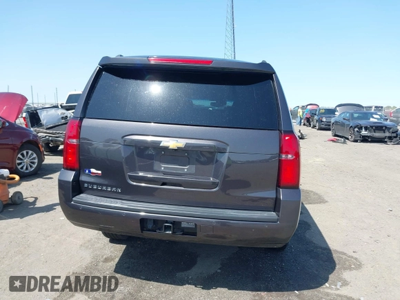 2018 Chevrolet Suburban LT z VIN 1GNSCHKCXJR128787, wystawiony jako IAAI lot #41909965 z przebiegiem 123 020 mil mil oraz . Historia ofert i sprzedaży dostępna na DreamBid. Obrazek 16.