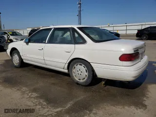 1994 Ford Taurus GL with VIN 1FALP52U7RG261559, listed as a Copart auction lot 55681304 with 28,675 mi miles and Salvage Title. Bid and sale history available at carsss.com. Image 2.