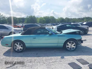 2003 Ford Thunderbird Deluxe z VIN 1FAHP60A33Y110451, wystawiony jako IAAI lot #42133863 z przebiegiem Nie podano mil oraz . Historia ofert i sprzedaży dostępna na DreamBid. Obrazek 14.