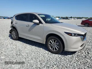 2024 Mazda CX-5 S Carbon Edition with VIN JM3KFBCL9R0434429, listed as a Copart auction lot 52990075 with 12,565 mi miles and Salvage Title. Bid and sale history available at DreamBid. Image 4.