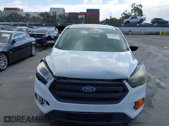 2018 Ford Escape S z VIN 1FMCU0F78JUA56974, wystawiony jako IAAI lot #42232294 z przebiegiem 63 511 mil mil oraz . Historia ofert i sprzedaży dostępna na DreamBid. Obrazek 12.