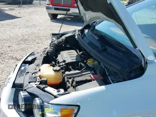 2014 Chevrolet Sonic LT z VIN 1G1JC5SB8E4100279, wystawiony jako IAAI lot #42054058 z przebiegiem 47 526 mil mil oraz . Historia ofert i sprzedaży dostępna na DreamBid. Obrazek 19.