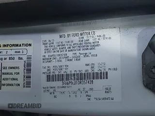 2013 Ford Fusion SE Hybrid with VIN 3FA6P0LU1DR357428, listed as a IAAI auction lot 41153491 with 153,738 mi miles. Bid and sale history available at carsss.com. Image 9.