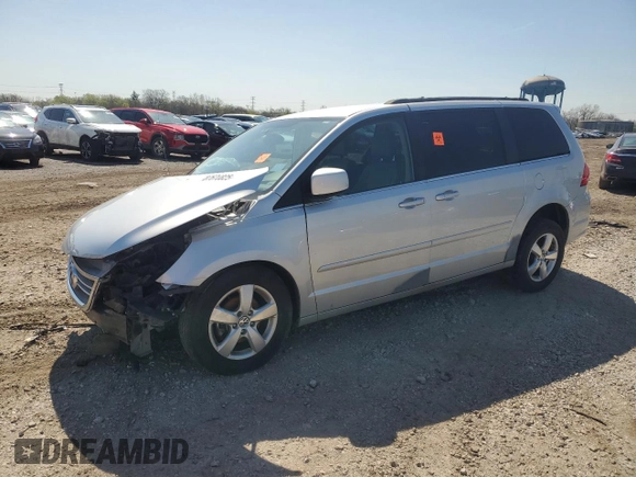 2011 Volkswagen Routan SE with VIN 2V4RW3DG0BR621820, listed as a Copart auction lot 87670825 with 180,222 mi miles and Salvage title. Bid and sale history available at DreamBid. Image 1.