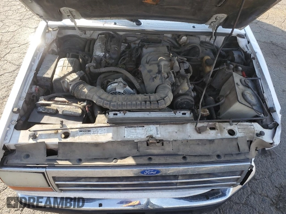 1994 Ford Explorer Eddie Bauer z VIN 1FMDU34X4RUE80513, wystawiony jako Copart lot #80094394 z przebiegiem 293 609 mil mil oraz Szkoda całkowita • Salvage title. Historia ofert i sprzedaży dostępna na DreamBid. Obrazek 11.