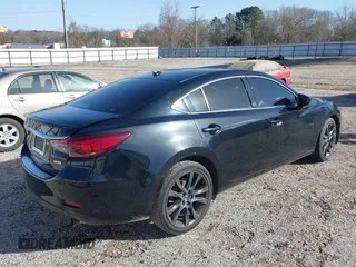 2016 Mazda 6 i Grand Touring with VIN JM1GJ1W50G1478699, listed as a IAAI auction lot 41711211 with 208,720 mi miles and . Bid and sale history available at DreamBid. Image 4.