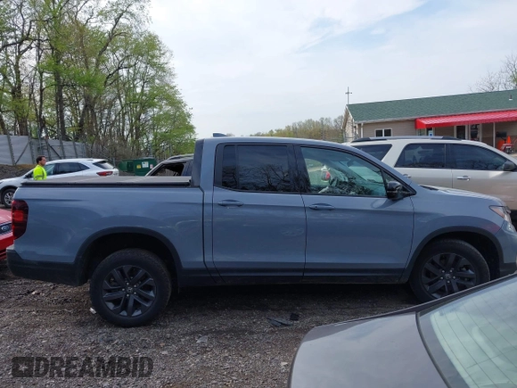 2024 Honda Ridgeline Sport with VIN 5FPYK3F18RB009341, listed as a IAAI auction lot 42159102 with 17,007 mi miles and . Bid and sale history available at DreamBid. Image 13.
