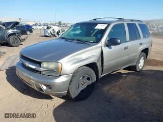 2003 Chevrolet TrailBlazer LS with VIN 1GNDT13SX32271126, listed as a IAAI auction lot 41760397 with 242,715 mi miles. Bid and sale history available at carsss.com. Image 2.