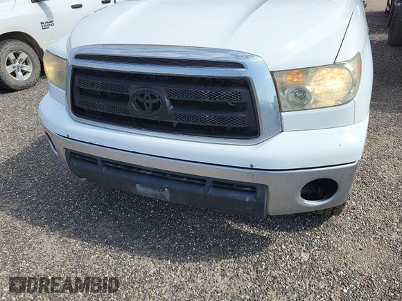 2011 Toyota Tundra with VIN 5TFUY5F1XBX198815, listed as a IAAI auction lot 42571444 with 281,114 mi miles and . Bid and sale history available at DreamBid. Image 13.