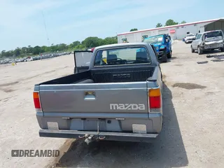 1992 Mazda B-Series Truck with VIN JM2UF313XN0306779, listed as a IAAI auction lot 42104583 with 137,826 mi miles and . Bid and sale history available at DreamBid. Image 16.