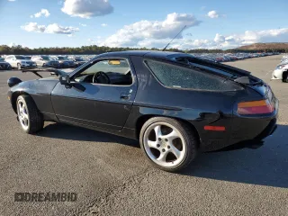 1989 Porsche 928 z VIN WP0JB0923KS861070, wystawiony jako Copart lot #76032254 z przebiegiem Nie podano mil oraz Szkody całkowita. Historia ofert i sprzedaży dostępna na DreamBid. Obrazek 2.