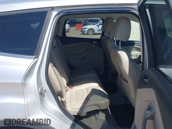 2013 Ford Escape SEL with VIN 1FMCU9H91DUA14749, listed as a IAAI auction lot 42039685 with 186,669 mi miles. Bid and sale history available at carsss.com. Image 8.
