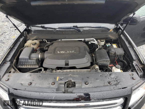2015 GMC Canyon 4WD SLE with VIN 1GTG6BE37F1157166, listed as a Copart auction lot 71279914 with 114,484 mi miles and Salvage Title. Bid and sale history available at carsss.com. Image 12.