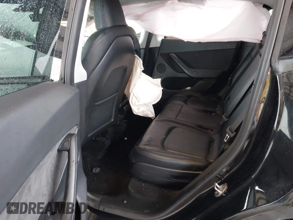 2023 Tesla Model Y Long Range with VIN 7SAYGAEE7PF739924, listed as a IAAI auction lot 41612323 with 75,226 mi miles and . Bid and sale history available at DreamBid. Image 8.
