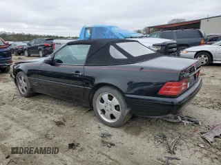 1999 Mercedes-Benz SL-Class with VIN WDBFA68F0XF184008, listed as a Copart auction lot 84998014 with 74,809 mi miles and Salvage Title. Bid and sale history available at carsss.com. Image 2.