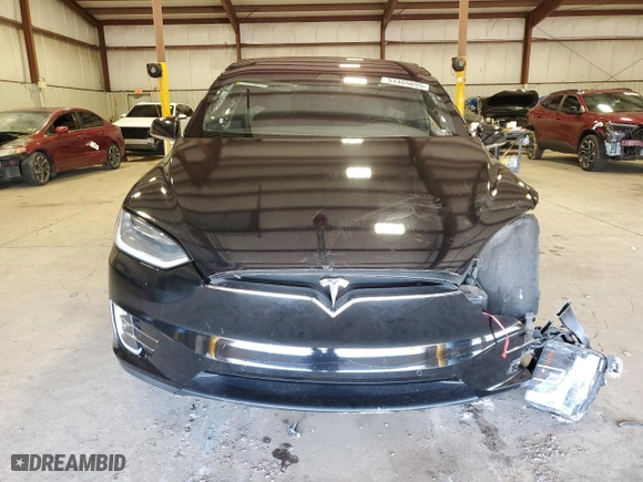 2018 Tesla Model X 75D with VIN 5YJXCAE29JF111980, listed as a Copart auction lot 51465695 with 0 mi miles and Salvage Title. Bid and sale history available at carsss.com. Image 5.