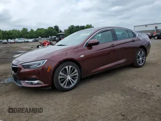 2019 Buick Regal Essence with VIN W04GP6SX9K1073446, listed as a Copart auction lot 64518185 with 65,036 mi miles and Salvage title. Bid and sale history available at DreamBid. Image 1.
