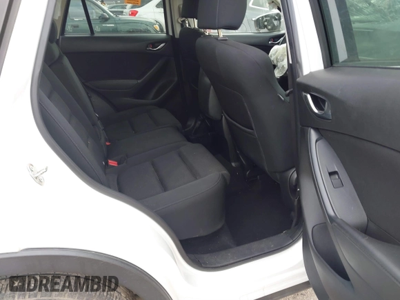 2016 Mazda CX-5 Touring with VIN JM3KE2CY1G0888850, listed as a IAAI auction lot 41562701 with 1 mi miles. Bid and sale history available at carsss.com. Image 8.